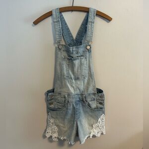 Ardene eighty two juniors 1 Light wash Denim Overalls with lace trim